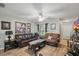 Living area featuring hardwood floors, comfortable seating, and abundant natural light at 944 Regatta Bay Dr # 12-102, Orange City, FL 32763