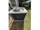 Exterior view of a newer Carrier HVAC unit providing central air conditioning at 96 Old Barn Trl, Ormond Beach, FL 32174