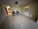 Spacious living area with tile floors, flooded with natural light, and easy access to other rooms at 96 Old Barn Trl, Ormond Beach, FL 32174