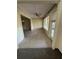 Inviting sun room with ceiling fan, tile flooring, and lots of natural light at 96 Old Barn Trl, Ormond Beach, FL 32174