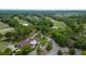 Expansive aerial view of a golf course community featuring lush greenery and well-maintained landscapes at 978 Victoria Hills S Dr, Deland, FL 32724