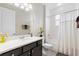Neutral bathroom with tub and shower combo features modern vanity and fixtures at 978 Victoria Hills S Dr, Deland, FL 32724