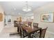 Spacious dining area connected to living spaces, filled with natural light and stylish decor at 978 Victoria Hills S Dr, Deland, FL 32724