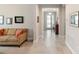 Inviting foyer and living area featuring tile flooring, neutral paint and ample natural light at 978 Victoria Hills S Dr, Deland, FL 32724