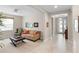 Inviting living and foyer featuring tile flooring, neutral paint and ample natural light at 978 Victoria Hills S Dr, Deland, FL 32724