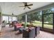 Spacious screened patio with comfortable seating areas and views of the lush backyard at 978 Victoria Hills S Dr, Deland, FL 32724