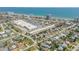 Aerial view of the condo in the landscape of buildings and ocean views at 10 Lynnhurst Dr # 1050, Ormond Beach, FL 32176