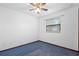Cozy bedroom with carpet and window, perfect for relaxation at 1018 E Gaucho Cir, Deltona, FL 32725