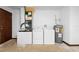 Laundry area with a washer, dryer, and water heater at 1018 E Gaucho Cir, Deltona, FL 32725