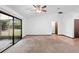Inviting living area with sliding glass doors to screened patio and easy access to backyard at 1018 E Gaucho Cir, Deltona, FL 32725