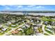A wide aerial view shows the location in the community with a view of the water and nearby downtown at 1027 Bel Aire Dr, Daytona Beach, FL 32118