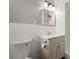 This bathroom features tile and a vanity with storage at 1027 Bel Aire Dr, Daytona Beach, FL 32118