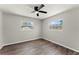 This bedroom features hard surface floors and bright windows at 1027 Bel Aire Dr, Daytona Beach, FL 32118