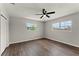 This bedroom has hard surface floors and windows overlooking a pleasant yard at 1027 Bel Aire Dr, Daytona Beach, FL 32118