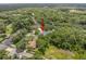 Birds-eye view highlighting the home's placement and surroundings in the neighborhood at 1205 Weeping Willow Dr, Deland, FL 32724