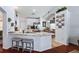 Kitchen with stainless steel appliances, granite countertops, an island, and barstool seating at 1205 Weeping Willow Dr, Deland, FL 32724