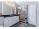 Modern main bathroom featuring a tiled shower and updated vanity at 1205 Weeping Willow Dr, Deland, FL 32724