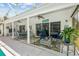 Inviting covered patio featuring outdoor seating, a ceiling fan, and views of the pool, perfect for relaxation and entertainment at 1205 Weeping Willow Dr, Deland, FL 32724