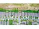 Aerial view showcasing homes located on golf course, surrounded by green lawns and tree lined streets at 1227 Victoria Hills N Dr, Deland, FL 32724