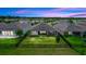 Aerial view showcasing a meticulously maintained backyard with lush green lawn and black iron fence at 1227 Victoria Hills N Dr, Deland, FL 32724