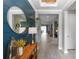 Inviting foyer with stylish decor, a wooden console table, and a view into other rooms at 1227 Victoria Hills N Dr, Deland, FL 32724