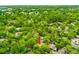 Beautiful aerial view showcases home tucked in lush green setting, emphasizing privacy and natural environment at 127 Cypress Pond Rd, Port Orange, FL 32128
