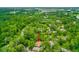 Lush aerial view of home situated among a forest of trees; offers private setting with natural beauty at 127 Cypress Pond Rd, Port Orange, FL 32128