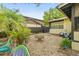 Landscaped backyard with mature plants and patio furniture at 127 Cypress Pond Rd, Port Orange, FL 32128