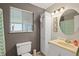 Bathroom featuring a yellow sink, white vanity, round mirror, and modern lighting at 127 Cypress Pond Rd, Port Orange, FL 32128