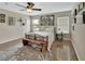 Bedroom featuring a bed with bench, and several pieces of hanging wall art at 1310 Pup Fish Ln, Deland, FL 32724