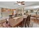 Open-concept dining area leading to a spacious kitchen and living room at 1310 Pup Fish Ln, Deland, FL 32724