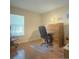 Bright office space with hardwood floors, a window, and a vintage rolltop desk at 1310 Pup Fish Ln, Deland, FL 32724
