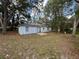Rear exterior with foliage at 1370 19Th St, Orange City, FL 32763