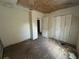 An empty bedroom with a closet and views to an adjacent room at 1370 19Th St, Orange City, FL 32763