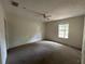 Bedroom with standard window and ceiling fan at 1370 19Th St, Orange City, FL 32763