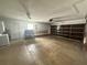 Spacious garage with an automatic door and plenty of room for storage and parking at 1556 Ferendina Dr, Deltona, FL 32725