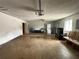 Large garage space with garage door, room for washer and dryer, and a window that provides natural light at 1556 Ferendina Dr, Deltona, FL 32725