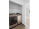 Laundry room equipped with front-load washer and dryer units at 1683 10Th Ave, Deland, FL 32724