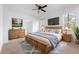 Inviting main bedroom with natural light, a ceiling fan, and stylish furnishings, creating a tranquil retreat at 1683 10Th Ave, Deland, FL 32724