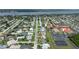 Neighborhood aerial view showcasing a waterway nearby, with neatly arranged homes and the street view at 179 Ann Rustin S Dr, Ormond Beach, FL 32176
