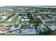 Aerial view of a property showcasing a large private pool and landscaped yard, ideal for outdoor enjoyment at 179 Ann Rustin S Dr, Ormond Beach, FL 32176