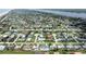 Aerial showcasing the community close to the beach with beautiful homes and palm trees dotting the landscape at 179 Ann Rustin S Dr, Ormond Beach, FL 32176