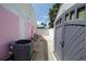 Exterior view with an AC Unit and gray storage shed at 179 Ann Rustin S Dr, Ormond Beach, FL 32176