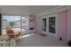 Enclosed patio with white trim and view of brick paved area at 179 Ann Rustin S Dr, Ormond Beach, FL 32176
