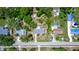 Aerial view of the house showing the roof, driveway, and surrounding neighborhood at 18 S Shell Rd, Debary, FL 32713