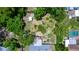 An aerial view of the backyard showing the various patio structures and the location of a storage shed at 18 S Shell Rd, Debary, FL 32713