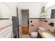 Pink and black bathroom with tile, featuring updated vanity at 18 S Shell Rd, Debary, FL 32713