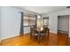 Open dining room features hardwood floors, gray walls and lots of natural light at 18 S Shell Rd, Debary, FL 32713