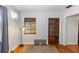 Bright dining area features hardwood floors and natural light through the window at 18 S Shell Rd, Debary, FL 32713