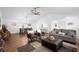 Bright living area featuring wood floors, neutral tones, and open layout at 185 Brookside Dr, Port Orange, FL 32128